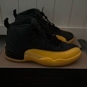 Air Jordan 12 Retro Sneaker
Worn but in Good Condition
Comes with Original Box